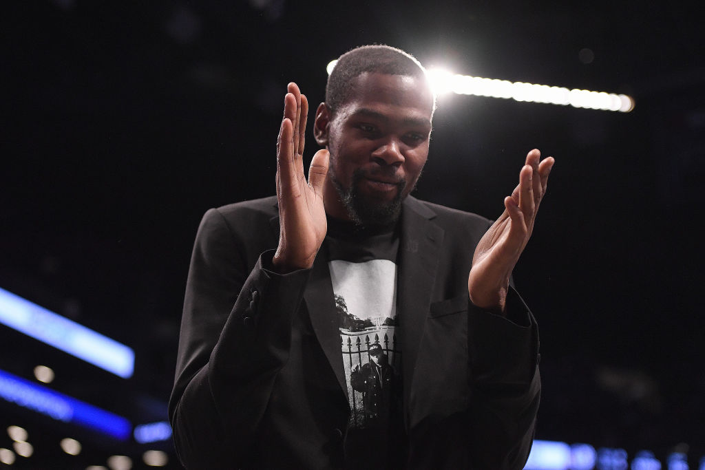 Kevin Durant #7 of the Brooklyn Nets reacts during the game against the Philadelphia 76ers at Barclays Center on December 15, 2019, in New York City. Photo by Matteo Marchi/Getty Images