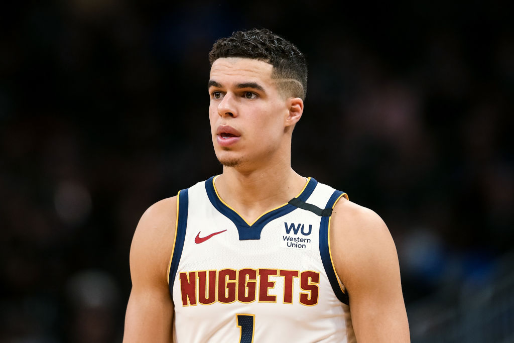 Michael Porter Jr. #1 of the Denver Nuggets walks across the court in the third quarter against the Milwaukee Bucks at the Fiserv Forum. Photo by Dylan Buell/Getty Images