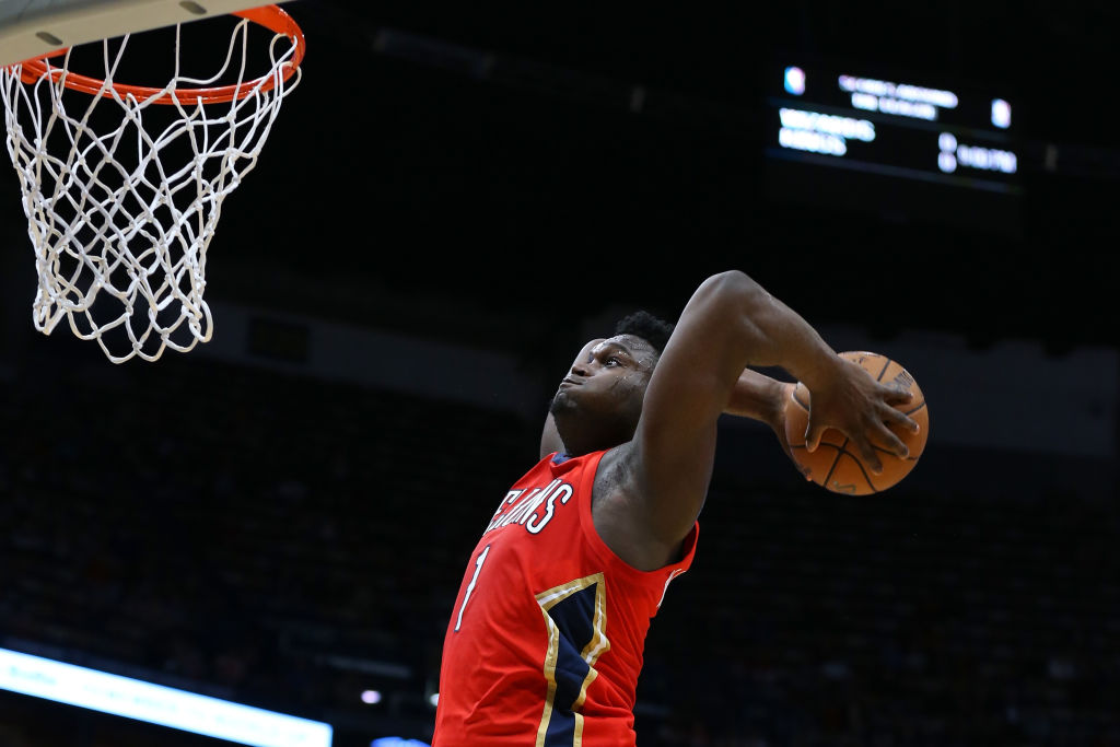 Zion Williamson #1 of the New Orleans Pelicans dunks against the Minnesota Timberwolves at the Smoothie King Center, in New Orleans, Louisiana. Photo by Jonathan Bachman/Getty Images