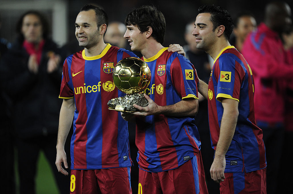 Iniesta, Messi and Xavi